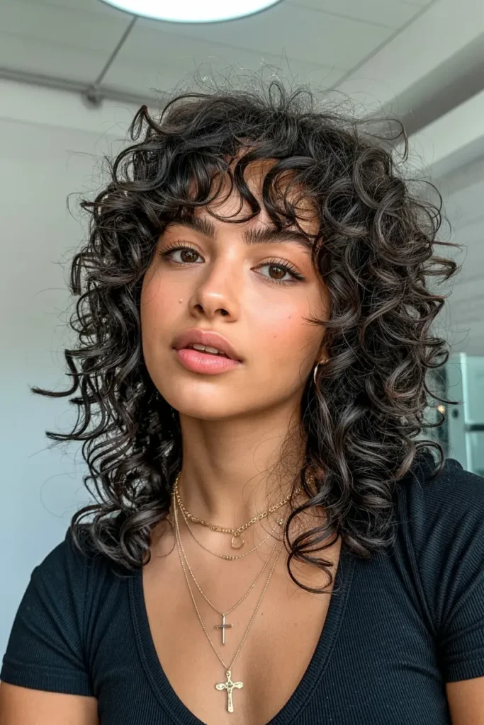 41. Butterfly Haircut on Curly Hair with Big Volume