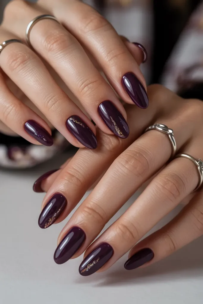 9. Deep Plum Aura Nails
